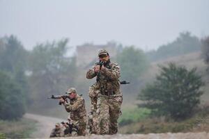 A disciplined and specialized military unit, donned in camouflage, strategically patrolling and maintaining control in a high-stakes environment, showcasing their precision, unity, and readiness for photo