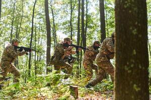 A disciplined and specialized military unit, donned in camouflage, strategically patrolling and maintaining control in a high-stakes environment, showcasing their precision, unity, and readiness for photo