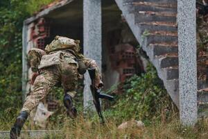 In a high stakes mission, a specialized military unit executes a tactical operation to secure a dangerous house where terrorists are believed to be hiding, showcasing precision and coordinated photo