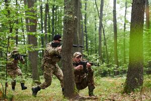 A disciplined and specialized military unit, donned in camouflage, strategically patrolling and maintaining control in a high-stakes environment, showcasing their precision, unity, and readiness for photo