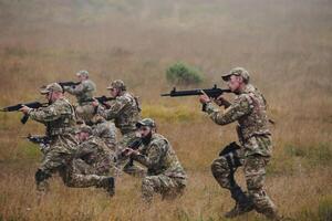 A disciplined and specialized military unit, donned in camouflage, strategically patrolling and maintaining control in a high-stakes environment, showcasing their precision, unity, and readiness for photo