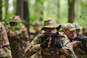 A disciplined and specialized military unit, donned in camouflage, strategically patrolling and maintaining control in a high-stakes environment, showcasing their precision, unity, and readiness for photo