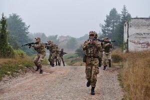 A disciplined and specialized military unit, donned in camouflage, strategically patrolling and maintaining control in a high-stakes environment, showcasing their precision, unity, and readiness for photo
