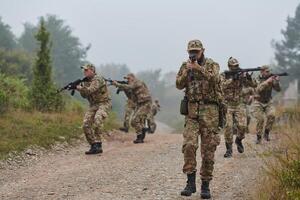 A disciplined and specialized military unit, donned in camouflage, strategically patrolling and maintaining control in a high-stakes environment, showcasing their precision, unity, and readiness for photo