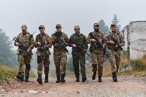 A disciplined and specialized military unit, donned in camouflage, strategically patrolling and maintaining control in a high-stakes environment, showcasing their precision, unity, and readiness for photo
