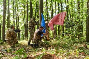 A disciplined and specialized military unit, donned in camouflage, strategically patrolling and maintaining control in a high-stakes environment, showcasing their precision, unity, and readiness for photo