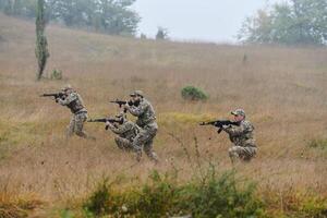 A disciplined and specialized military unit, donned in camouflage, strategically patrolling and maintaining control in a high-stakes environment, showcasing their precision, unity, and readiness for photo