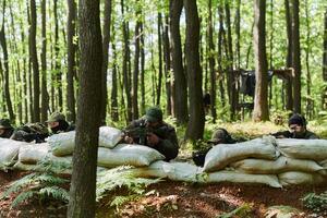 A disciplined and specialized military unit, donned in camouflage, strategically patrolling and maintaining control in a high-stakes environment, showcasing their precision, unity, and readiness for photo