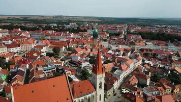 Aerial revealing view of Znojmo city with castle and St. Nicholas cathedral in Czechia in August 2024 video