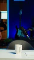 Vertical Influencer entering home studio, doing live broadcast for online streaming platforms, talking with fans, sharing story. Media star telling viewers about himself, camera A video