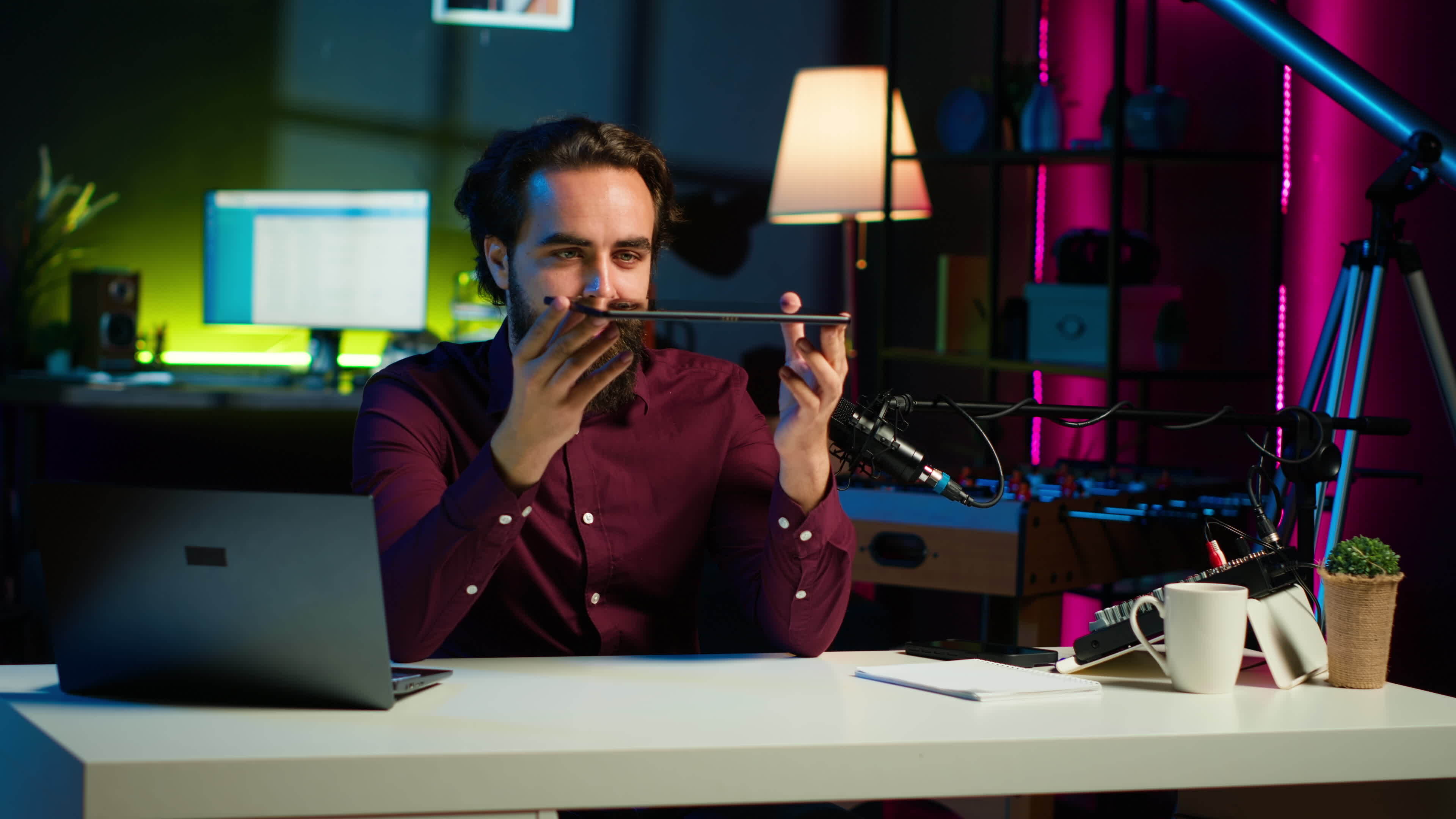 Tech expert presenting tablet in entry level low budget price range to