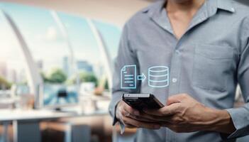 Man using smartphone with data on screen photo