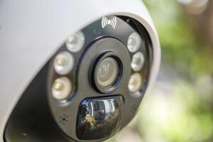 Security IP CCTV camera using solar energy install on the tree for home security system photo