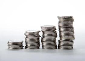 stacks of coins on a white background photo