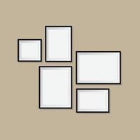Isolated against a wall, a blank picture frame template set vector
