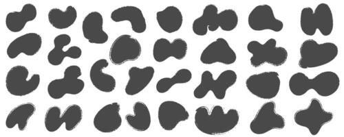 Brush abstract stains, paint shapes set with grunge texture. Round black ink splashes. Irregular organic blobs. Oval liquid rough graphic elements. Doodle blot blocks vector