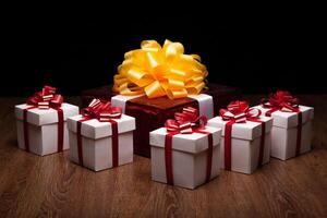 one large red gift box with small gift boxes photo