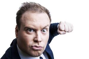 man in jacket threatening with fist isolated photo