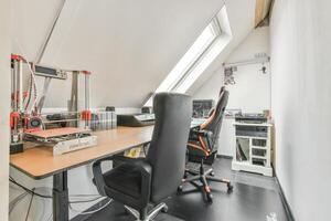 Office desk with computer and printer photo