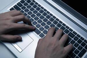 man is working at a computer photo