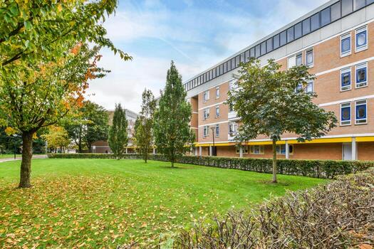 A large building with a clock on it photo