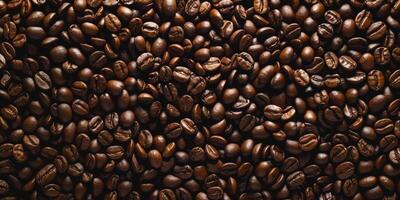 Coffee bean pattern. Hot drink concept with copyspace for text. Brown seed ingredient. Roasted mocha grain texture. Dark aromatic espresso background photo