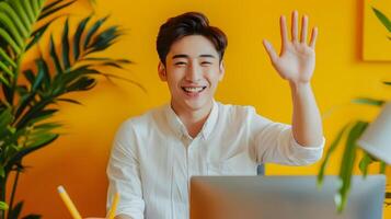 Smiling Hallyu Man Waves During Modern Office Call With Neo Pop Sensibility photo