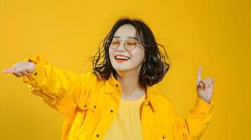 Smiling Hallyu Woman in Modern Neo Pop Styled Dance on Vibrant Yellow Background photo
