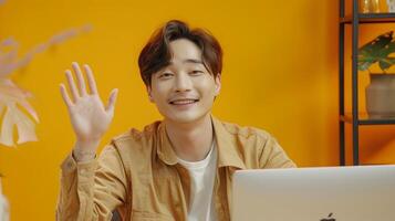 Smiling Man Waving During Call in Stylish Modern Office Setting photo