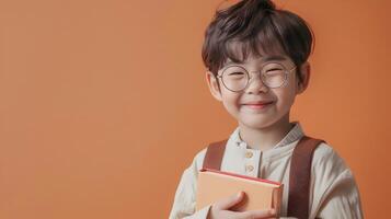Cheerful Korean Boy Holding Book with Vibrant Neo Pop Style Portrait photo