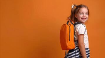 Cheerful Girl with Backpack Heading Back to School on Vibrant Orange Background photo