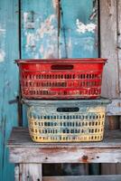 Vintage Rustic Wicker Basket on Weathered Wooden Planks Background photo