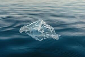 A plastic bag floating in the ocean photo