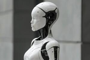 A white robot standing in front of a wall photo