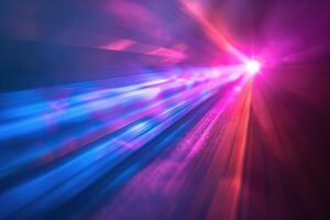 Light beam from a car speeding through the dark photo