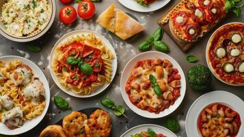 Various types of italian food on white plates photo