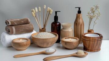 Various wooden items including a towel, soap, and a bowl photo