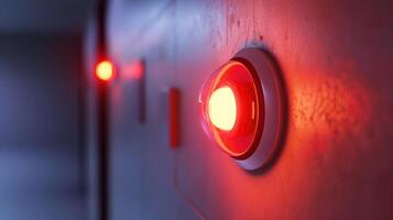 Red light on a wall in a dark room photo