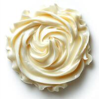 Swirl of creamy Alfredo sauce on a pristine white background smooth and rich in texture photo