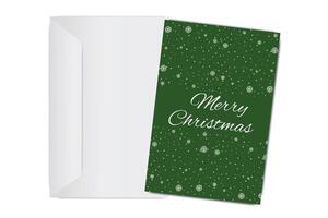 Christmas card with snowflakes and Merry Christmas typography on green background, accompanied by envelope vector