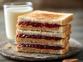 Stack of toasted sandwiches with peanut butter and jelly filling photo