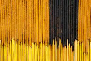 Incense sticks creating striking pattern. Aromatherapy and meditation concept. photo