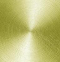 Golden circular brushed shiny metal texture. Abstract metallic background. Circle shape. photo