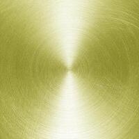 Golden circular brushed shiny metal texture. Abstract metallic background. Circle shape. photo