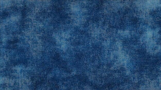 A blue denim fabric with a zigzag pattern. The fabric is blue and has a rough texture. photo