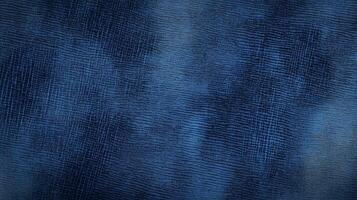 A blue denim fabric with a zigzag pattern. The fabric is blue and has a rough texture. photo