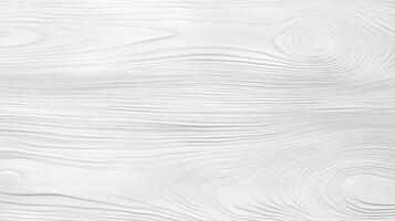 A wooden surface with a grainy texture. The wood is white and he is unfinished. The surface is smooth and has a natural look to it. photo