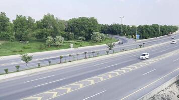 a highway with cars driving on it in Lahore on September 07, 2024. video