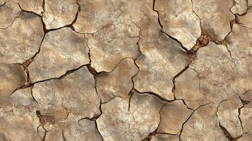 A cracked and broken surface with a lot of dirt and debris. The image has a rough and rugged appearance. photo