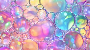 A colorful image of many small bubbles in various colors. The bubbles are floating in the air and appear to be floating in a rainbow. photo
